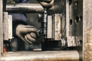 placing a mold for casting plastic