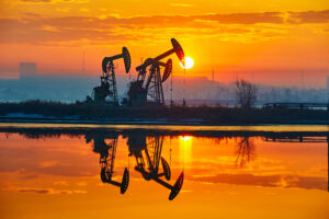 The sunrise of oil field landscape