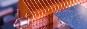 Copper heat pipe with dissipating fins on computer motherboard