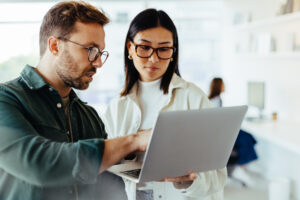 Design professionals standing in an office